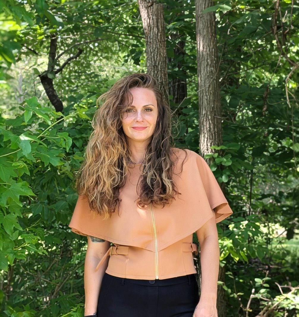 The founder of Pretty in Ink standing outdoors